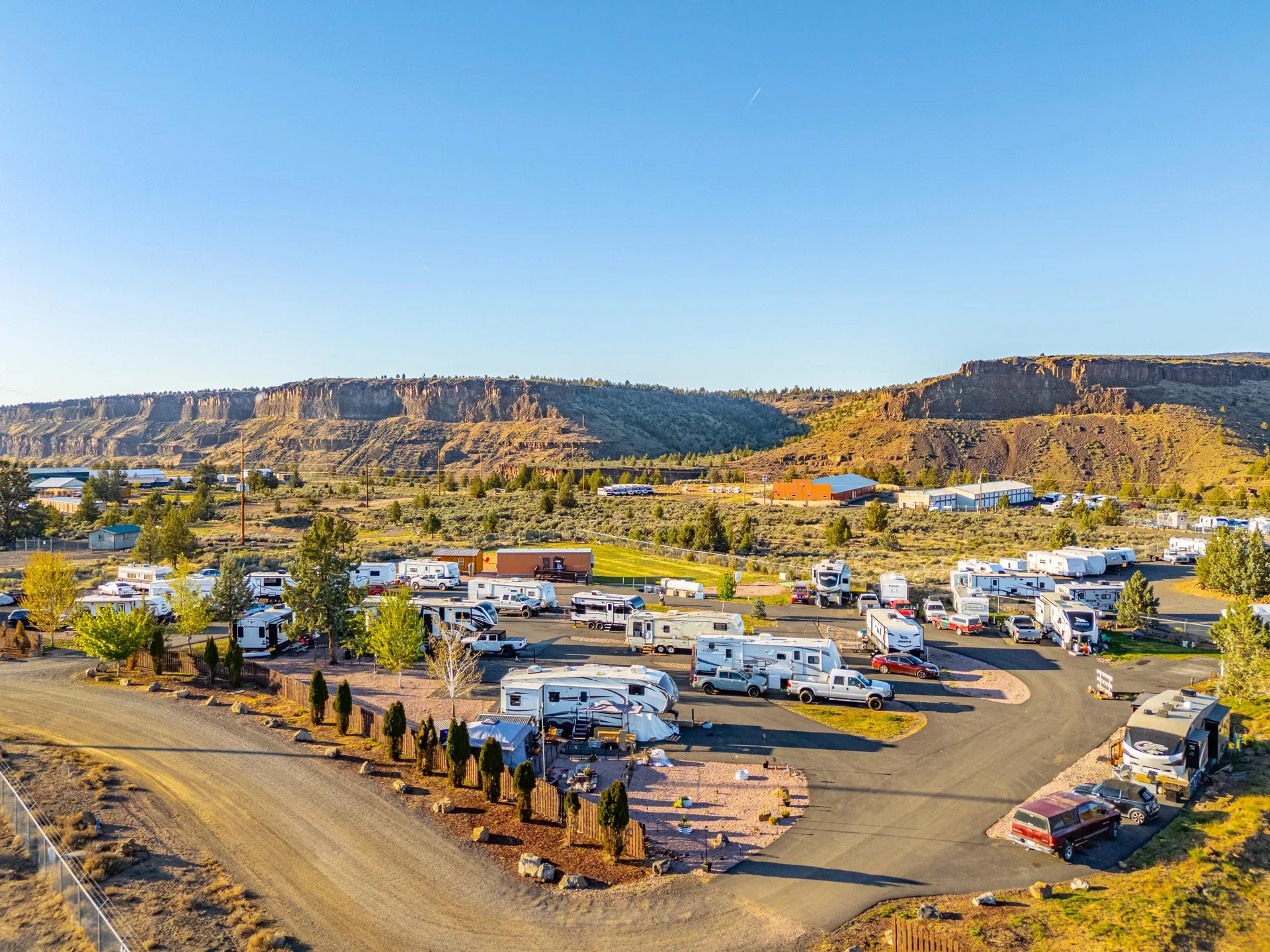 Aerial view of Copper Ridge RV Resort with canyon backdrop, Terrebonne Oregon